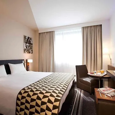 Отель Mercure Centre Lumiere 4*